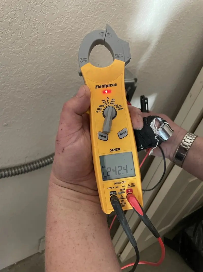 Voltage testing with clamp meter during Electrical Installation Services in Santa Fe Springs